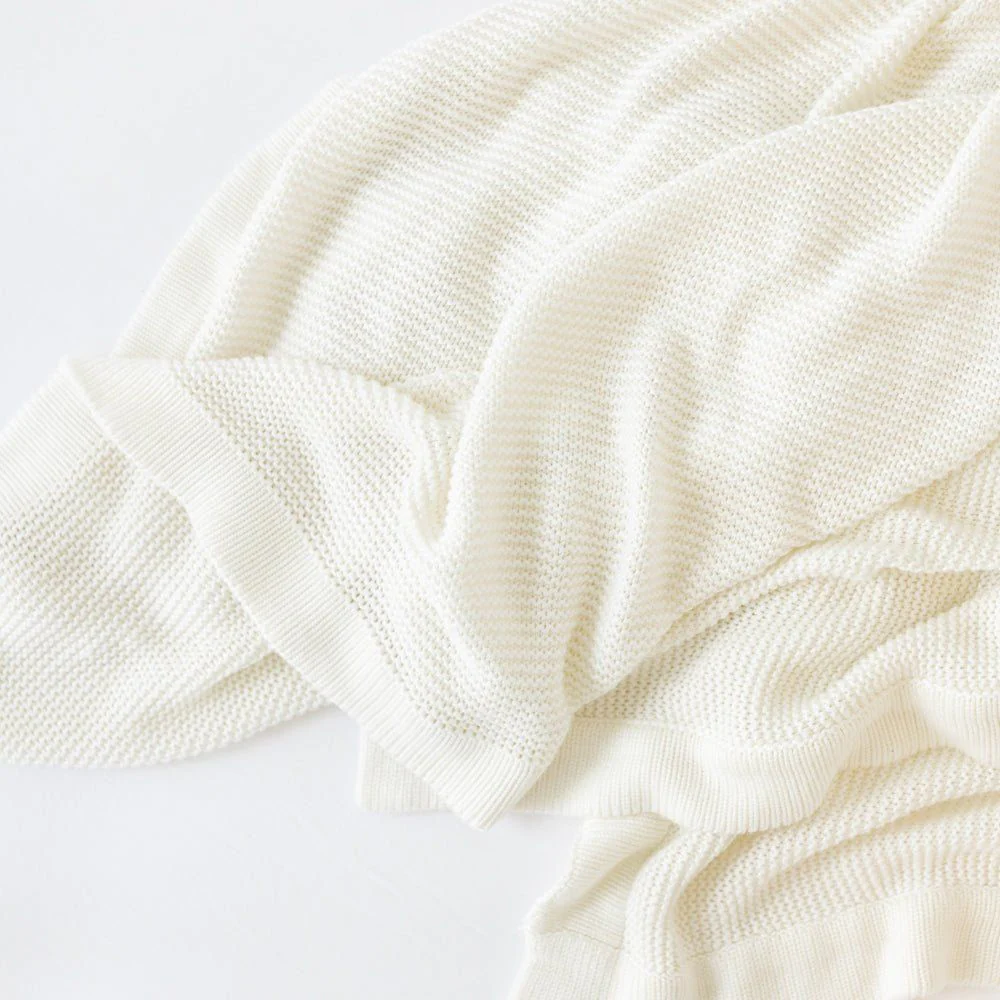 Cozy Earth Cloud Knit Baby Blanket Available in Ivory and White - Image 3