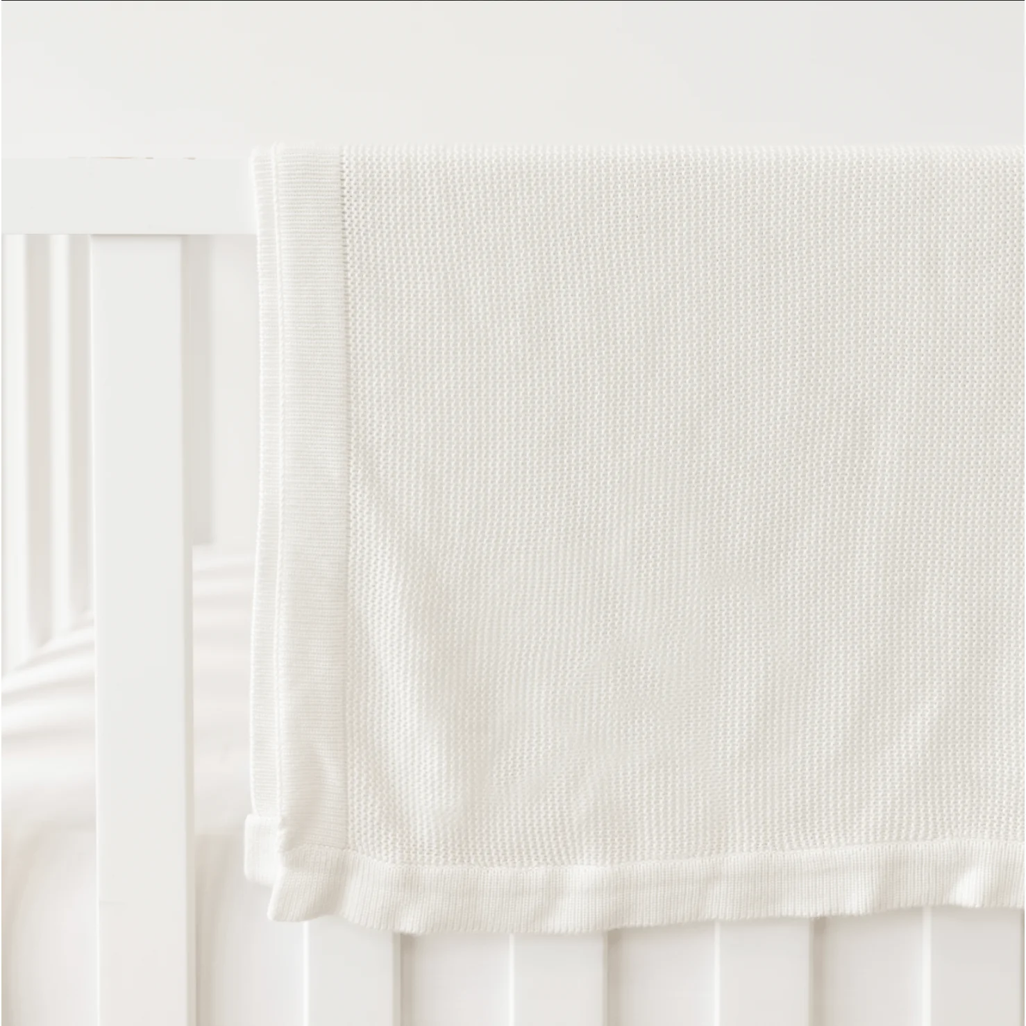 Cozy Earth Cloud Knit Baby Blanket Available in Ivory and White - Image 5