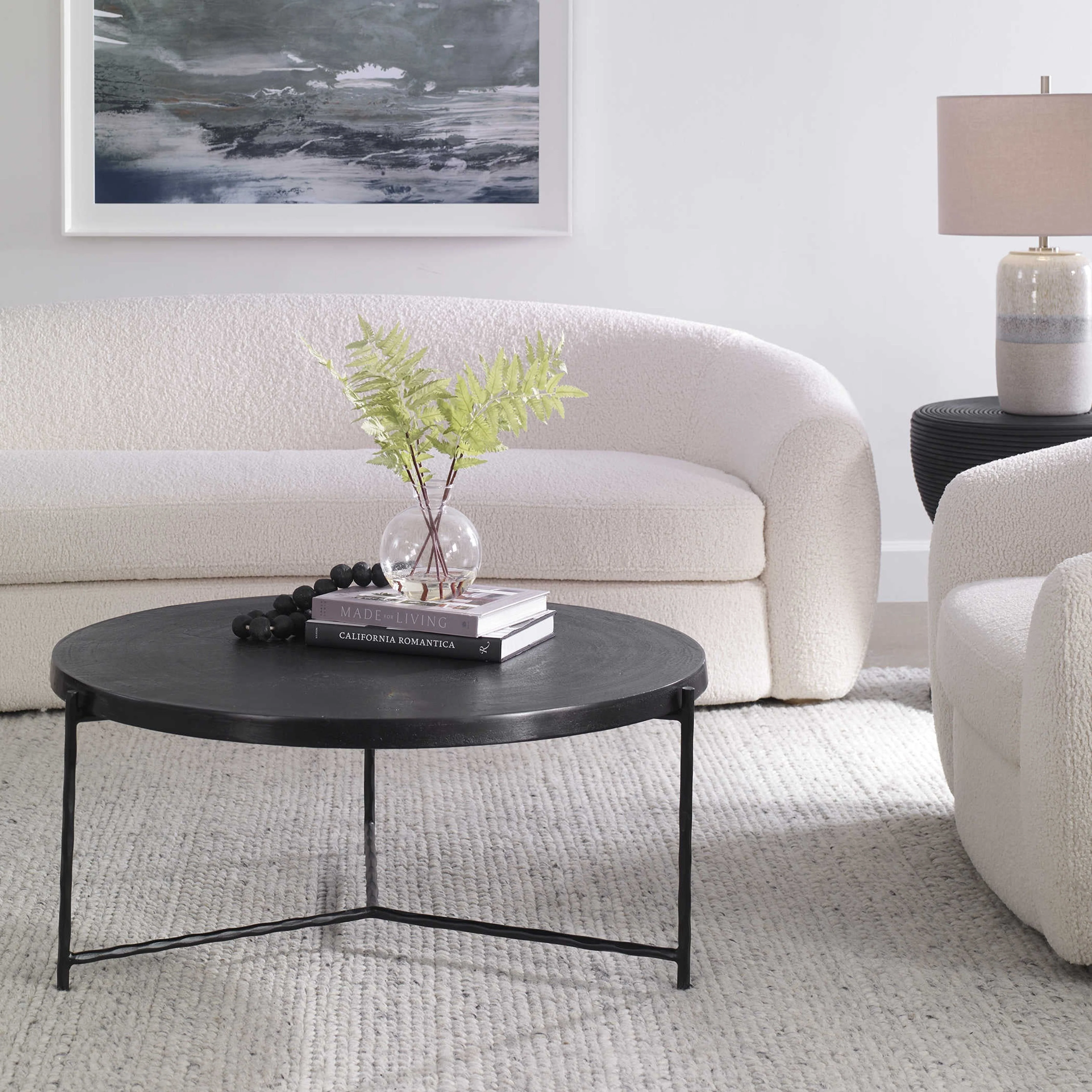 Uttermost Trellick Oxidized Black Top With Black Iron Base Modern Coffee Table