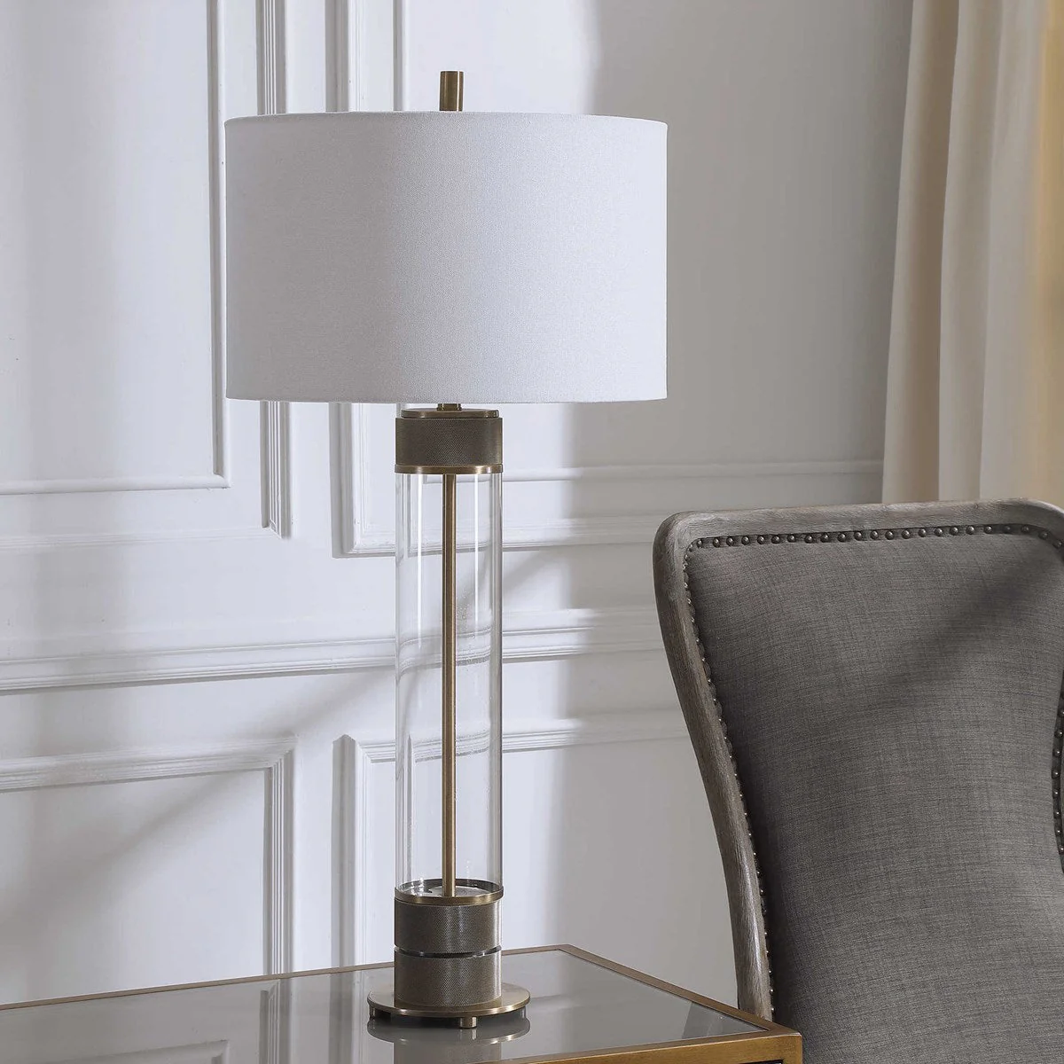 Uttermost Anmer Clear Glass and Antiqued Brass Iron Table Lamp With White Drum Shade - Image 4